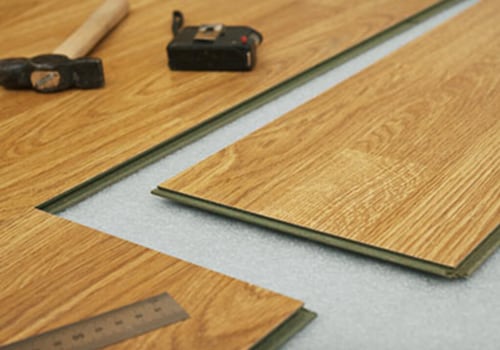 What are the negative features of laminate floor boards?